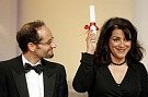 Mexican director Carlos Reygadas (L) looks at Iranian director Marjane Satrapi during the awards ceremony 60th Cannes Film Festival May 27, 2007. The directors were jointly awarded the Camera D'Or prize, Reygadas for his film STELLET LICHT, and Satrapi, who with her French co-director Vincent Paronnaud won the prize for their film PERSEPOLIS. REUTERS/Eric Gaillard (FRANCE) 